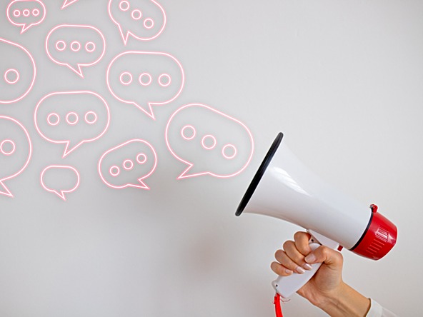 Megaphone with speech bubbles